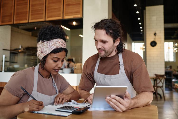 bakery employees counting their income together